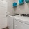 a laundry room with a washer and dryer