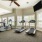fitness center with treadmills and elliptical 