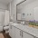 a bathroom with a marble countertop