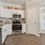a kitchen with white cabinets