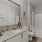 a bathroom with a marble countertop