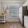 a kitchen with white cabinets